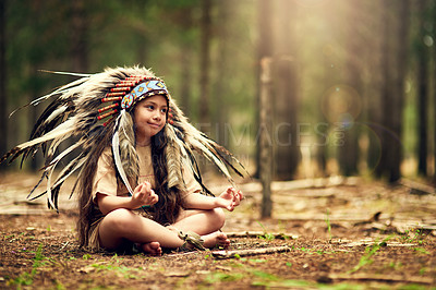 Buy stock photo Native American chief, forest and nature for meditation in childhood for connection with war bonnet in woods. Faith, girl and relax with mindfulness, peace and insight with reflection in California