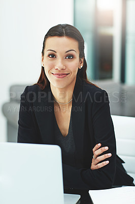 Buy stock photo Portrait of a young businesswoman working with her laptop in the office