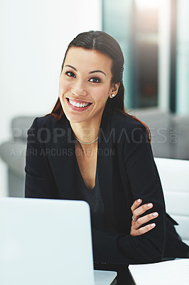 Buy stock photo Portrait of a young businesswoman working with her laptop in the office