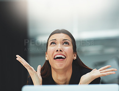 Buy stock photo Shot of a frantic businesswoman making a desperate gesture in the office