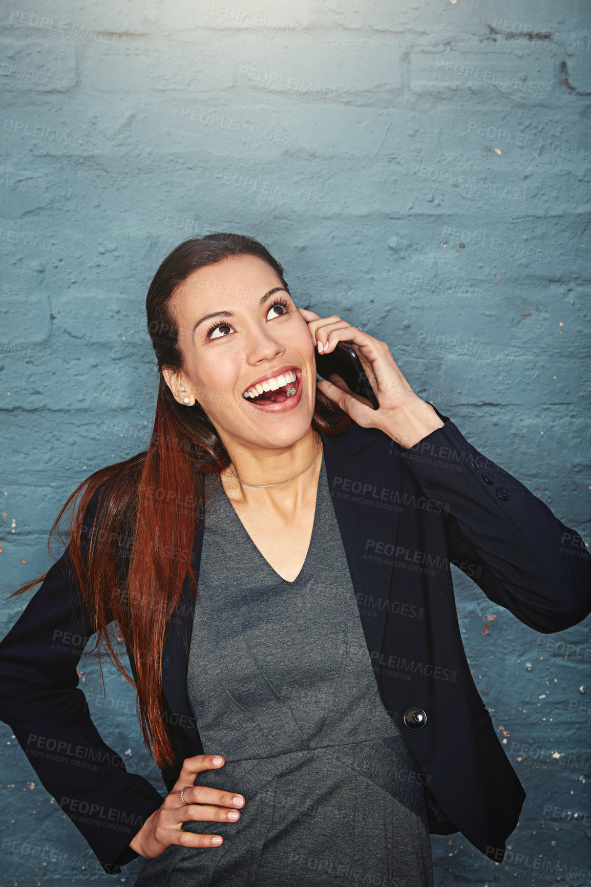 Buy stock photo Phone call, smile and businesswoman by brick wall with communication for finance deal with client. Contact, cellphone and female financial manager on mobile discussion for investment proposal.