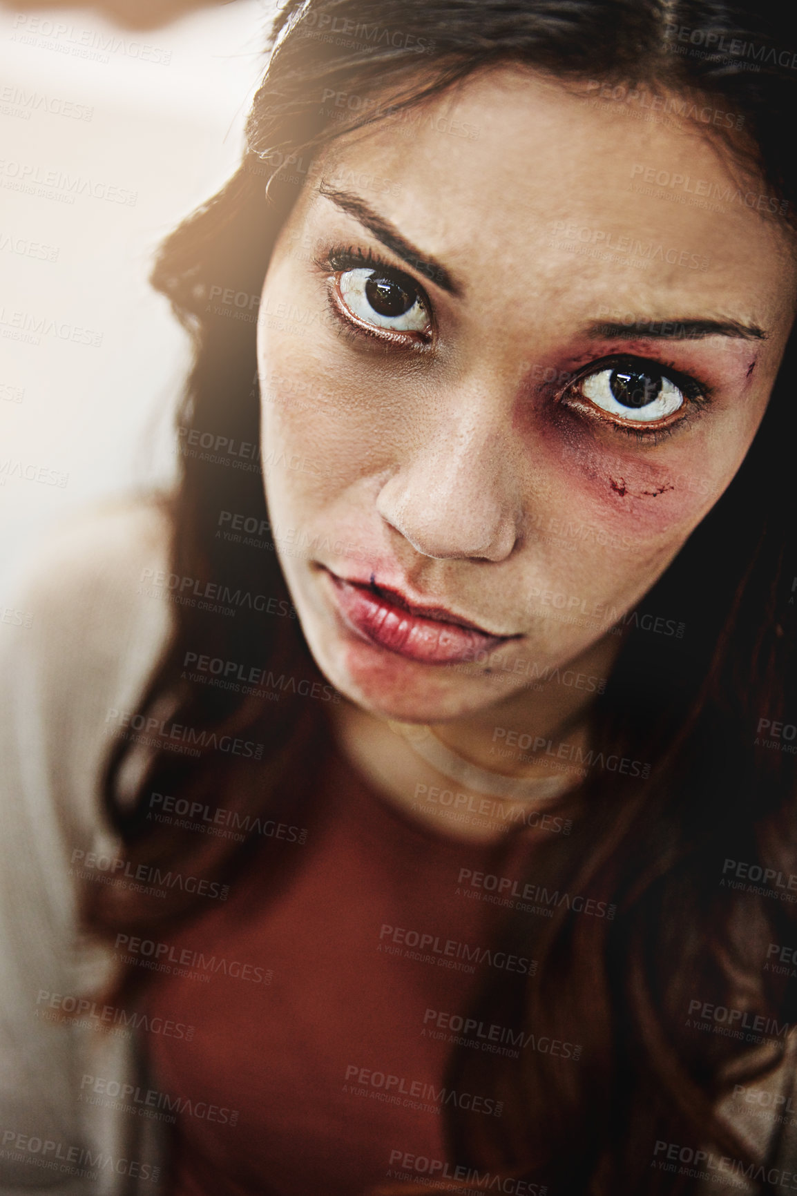 Buy stock photo Cropped portrait of a beaten and bruised young woman