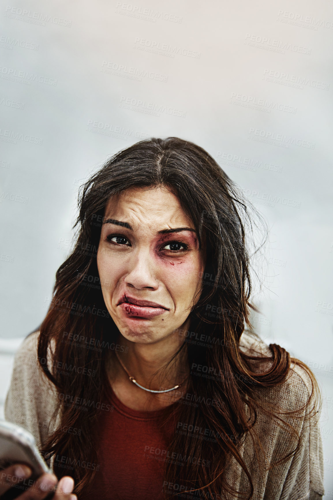 Buy stock photo Cropped portrait of a beaten and bruised young woman