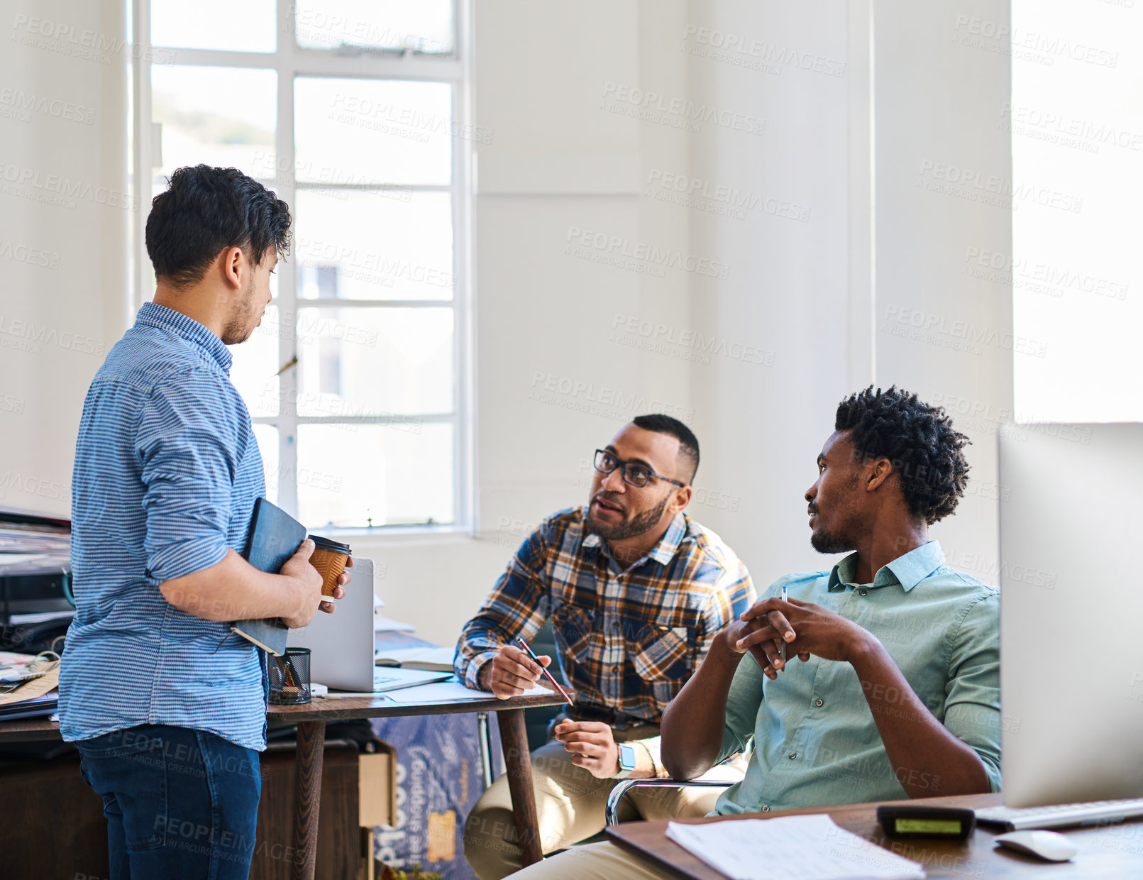 Buy stock photo Teamwork, tech and men in modern office with meeting for discussion, startup agency and brainstorming. Collaboration, conversation and planning for ideas by desk for advertising project and monitor