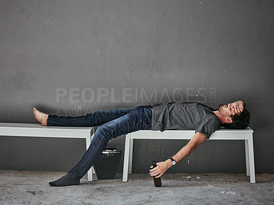 Buy stock photo Depression, addiction and drunk man sleeping with beer on bench outdoor for poverty, disaster or mental health crisis on wall background. Homeless, stress and alcoholic unconscious in city overdose