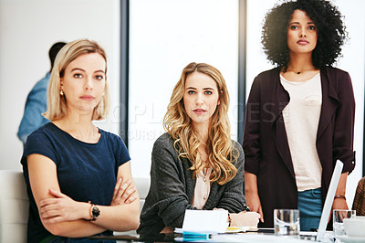 Buy stock photo Portrait of a group of young businesswomen having a meeting at work