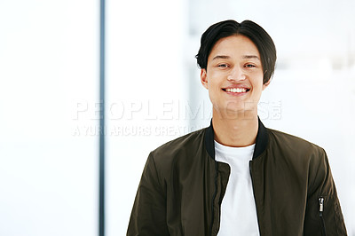 Buy stock photo Trendy, young and cool businessman in the millennial age happy to start his first day at work at a creative company or business with copy space background. Portrait face of one edgy marketing intern