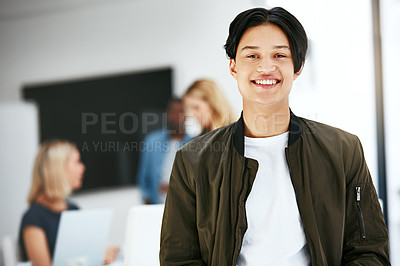 Buy stock photo Happy, confident and carefree business man relaxing in a modern office with colleagues in the background. Portrait of a young proud professional smiling, taking a break to rest at work