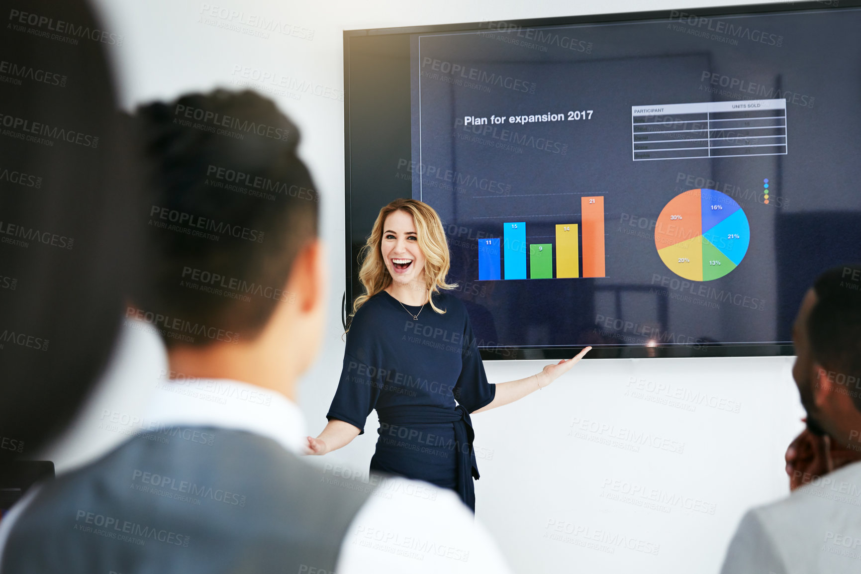 Buy stock photo Shot of a businesswoman giving a presentation to her colleagues at work
