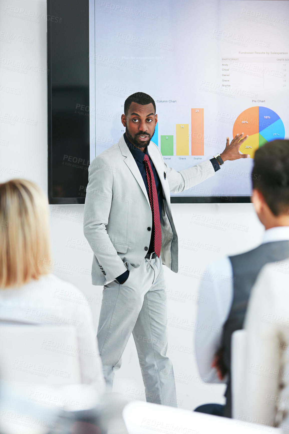 Buy stock photo Businessman, coach and chart with screen for presentation, meeting or corporate statistics at seminar. Black man, manager or speaker talking to group of employees on company revenue, growth or profit