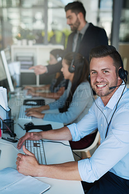 Buy stock photo Portrait of a happy and confident young man working in a call center