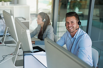 Buy stock photo Portrait of a happy and confident young man working in a call center