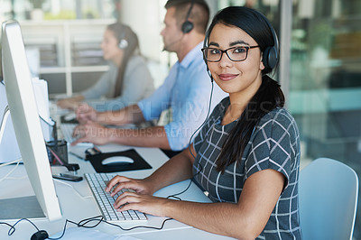 Buy stock photo Portrait of a happy and confident young woman working in a call center