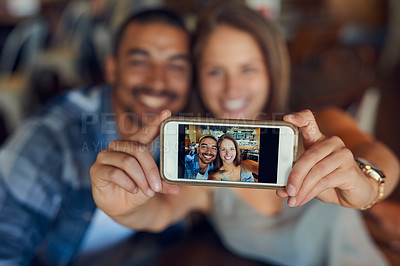 Buy stock photo Phone screen, selfie or happy couple at cafe for brunch date, romance or anniversary celebration. Smartphone, photography or people at restaurant on app for memory, profile picture and lunch