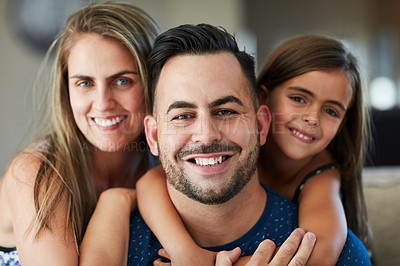 Buy stock photo Smile, hug and portrait of child with parents on sofa for fathers day celebration at home. Happy, love and girl kid embracing father and mother in living room for bonding at family house in Canada.