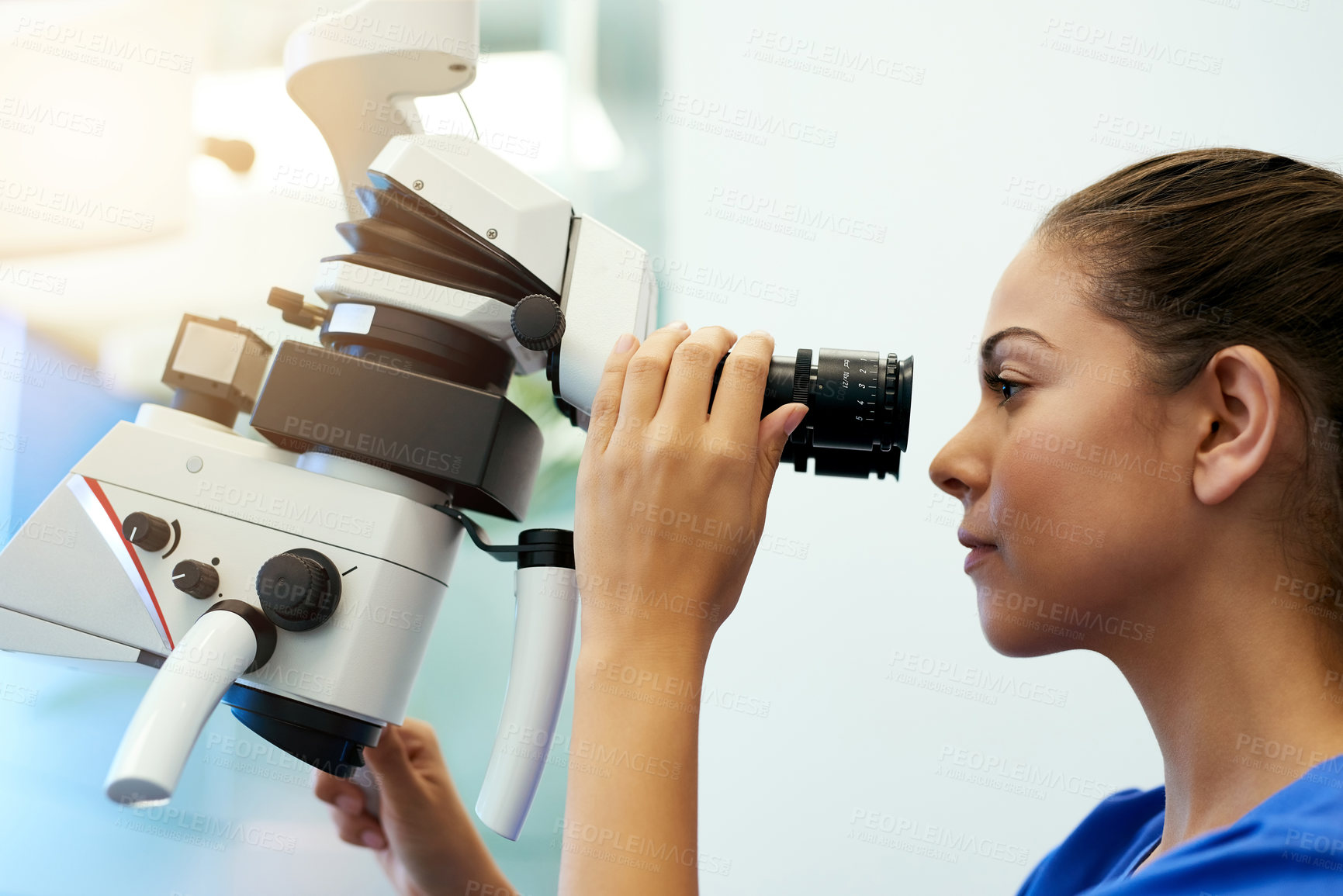 Buy stock photo Microscope, pathology and medical student with virus research at hospital or science lab. Woman, studying and clinic intern with scientist equipment and sample analysis for healthcare and experiment 