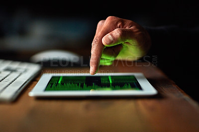 Buy stock photo Cropped shot of an unidentifiable hacker cracking a computer code in the dark