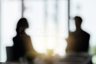 Buy stock photo Silhouette, blur and business people in meeting in office for discussion, planning and conversation. Corporate workplace, collaboration and blurred man and woman in conference room for partnership