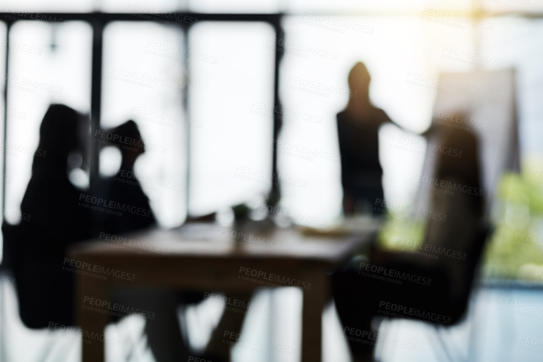 Buy stock photo Silhouette, presentation and blur of business people in meeting for discussion, planning and conversation. Corporate office, collaboration and men and women for teamwork, communication and workshop