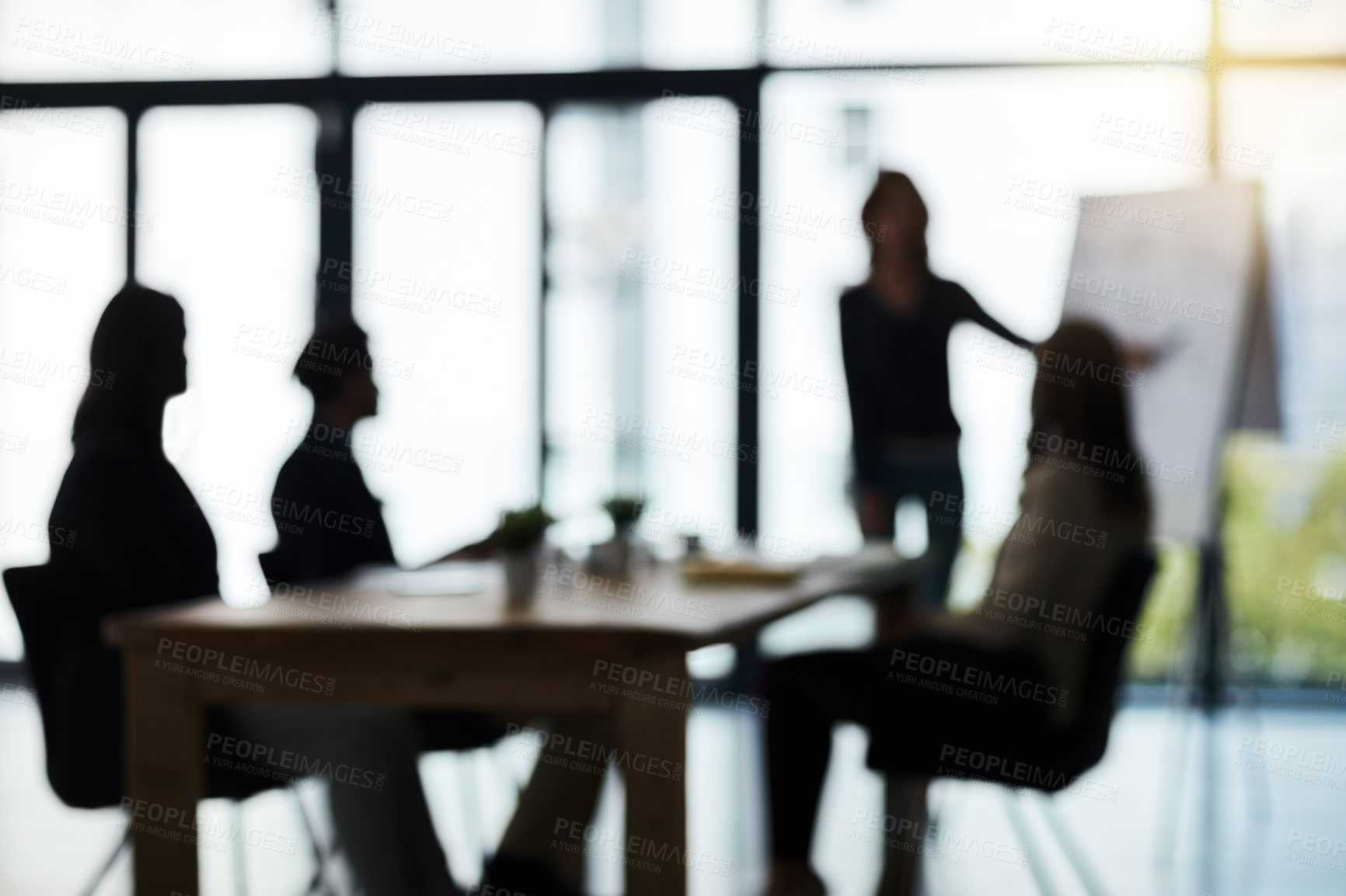 Buy stock photo Silhouette, meeting and blur of business people in office for presentation, planning and conversation. Corporate workplace, collaboration and men and women for teamwork, communication and strategy