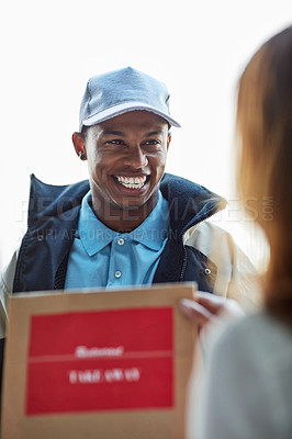 Buy stock photo Cropped shot of a courier making a delivery to a customer