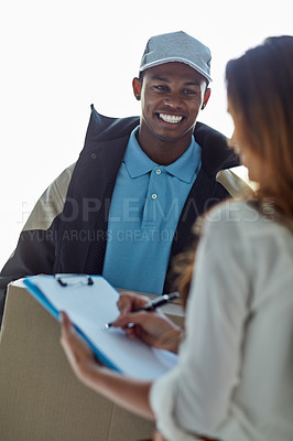 Buy stock photo Cropped shot of a businesswoman signing for a package delivered by a courier to her office