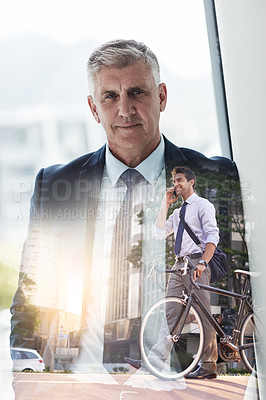 Buy stock photo Multiple exposure shot of a mature businessman superimposed over a young man riding a bicycle in the city