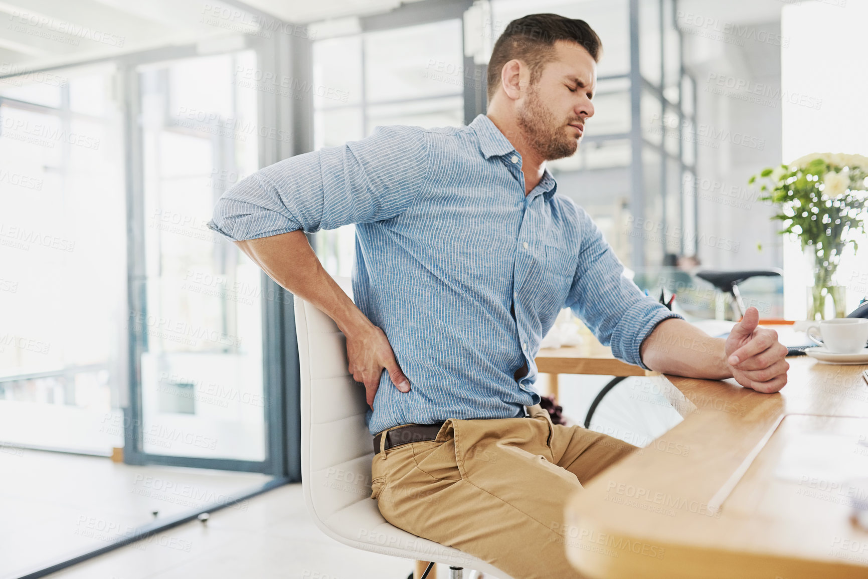 Buy stock photo Business man, back pain and stress in office with burnout, fatigue or muscle injury at desk. Businessman, tired body and rub with ache, frustrated or problem with accident, emergency and osteoporosis