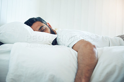Buy stock photo Tired, relax and a man on a bed for sleep, depression and fatigue at home. Rest, napping and a guy sleeping in the bedroom with insomnia, narcolepsy or depressed while lying looking exhausted