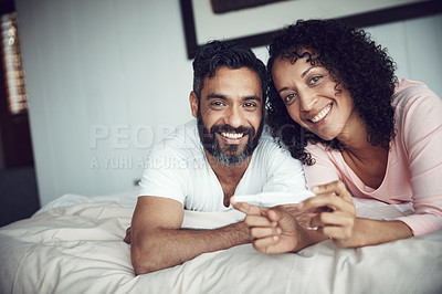 Buy stock photo Couple, happy and portrait with pregnancy test, bedroom and positive with smiling, results and excited. Man, woman and baby with stick, love and maternity for future family, surprise and pregnant