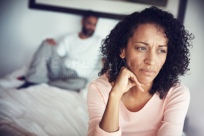 Buy stock photo Angry, sad and couple in bedroom for problem, divorce decision and marriage fail or mental health risk. Depression, fight and african woman thinking with partner at home depressed, anxiety or stress