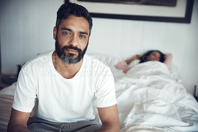 Buy stock photo Sad, depression and portrait of a man on a bed with wife sleeping in the morning. Upset, depressed and a mature male person looking tired, frustrated or unhappy with a woman in the bedroom for sleep