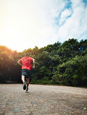 Buy stock photo Man in park, back and running for fitness in nature, exercise and training for marathon with athlete and sports. Runner, speed and challenge in workout, cardio outdoor for health with sky mockup