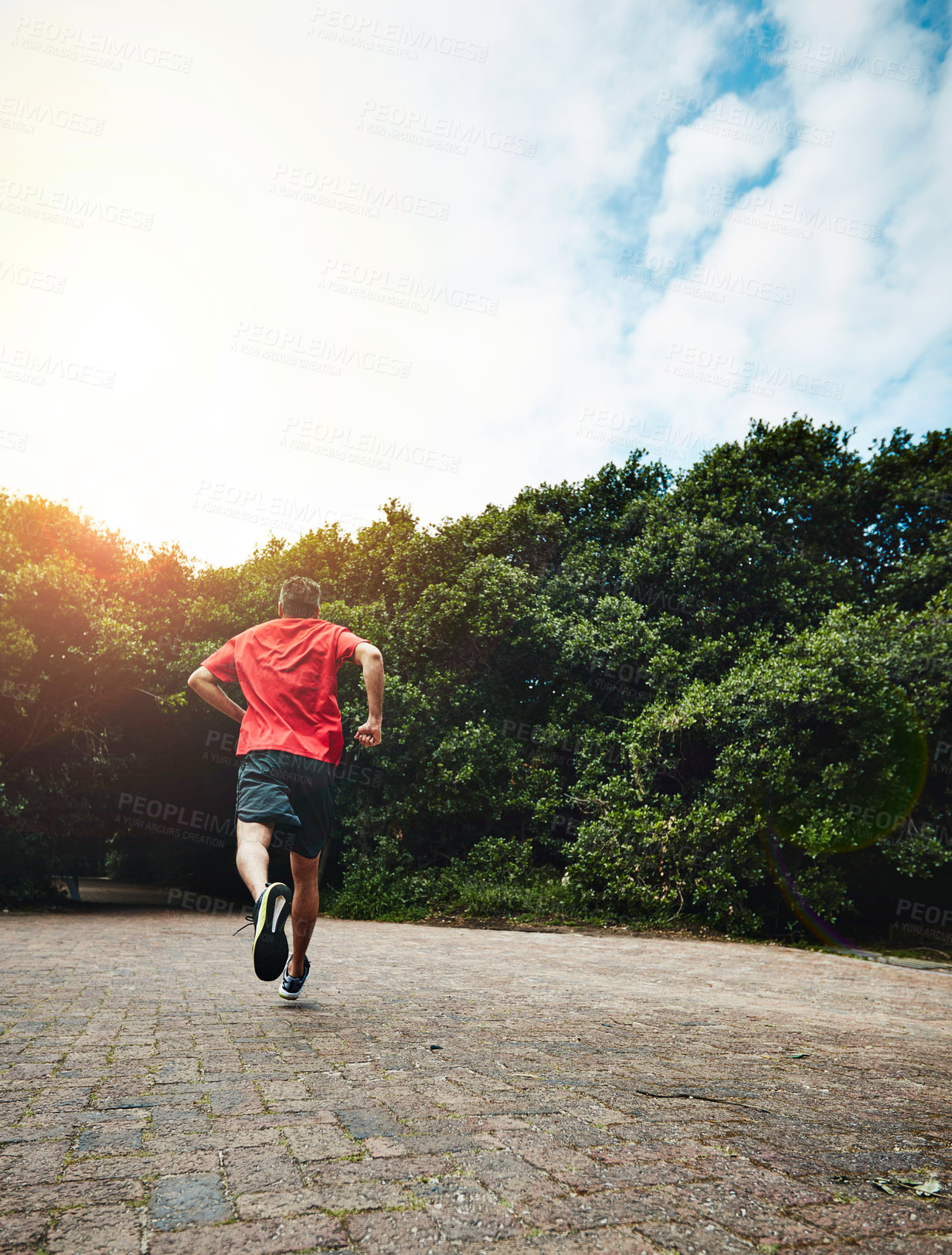 Buy stock photo Man in park, back and running for fitness in nature, exercise and training for marathon with athlete and sports. Runner, speed and challenge in workout, cardio outdoor for health with sky mockup