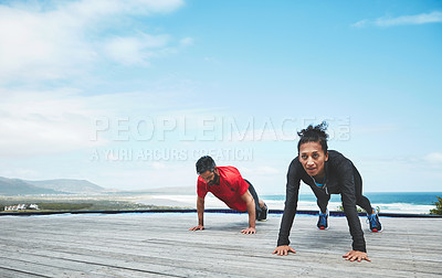 Buy stock photo Couple, beach and push ups outdoor, fitness and muscle training with strong people and bodybuilding. Power, challenge and weights with exercise and workout together in nature for bonding and health