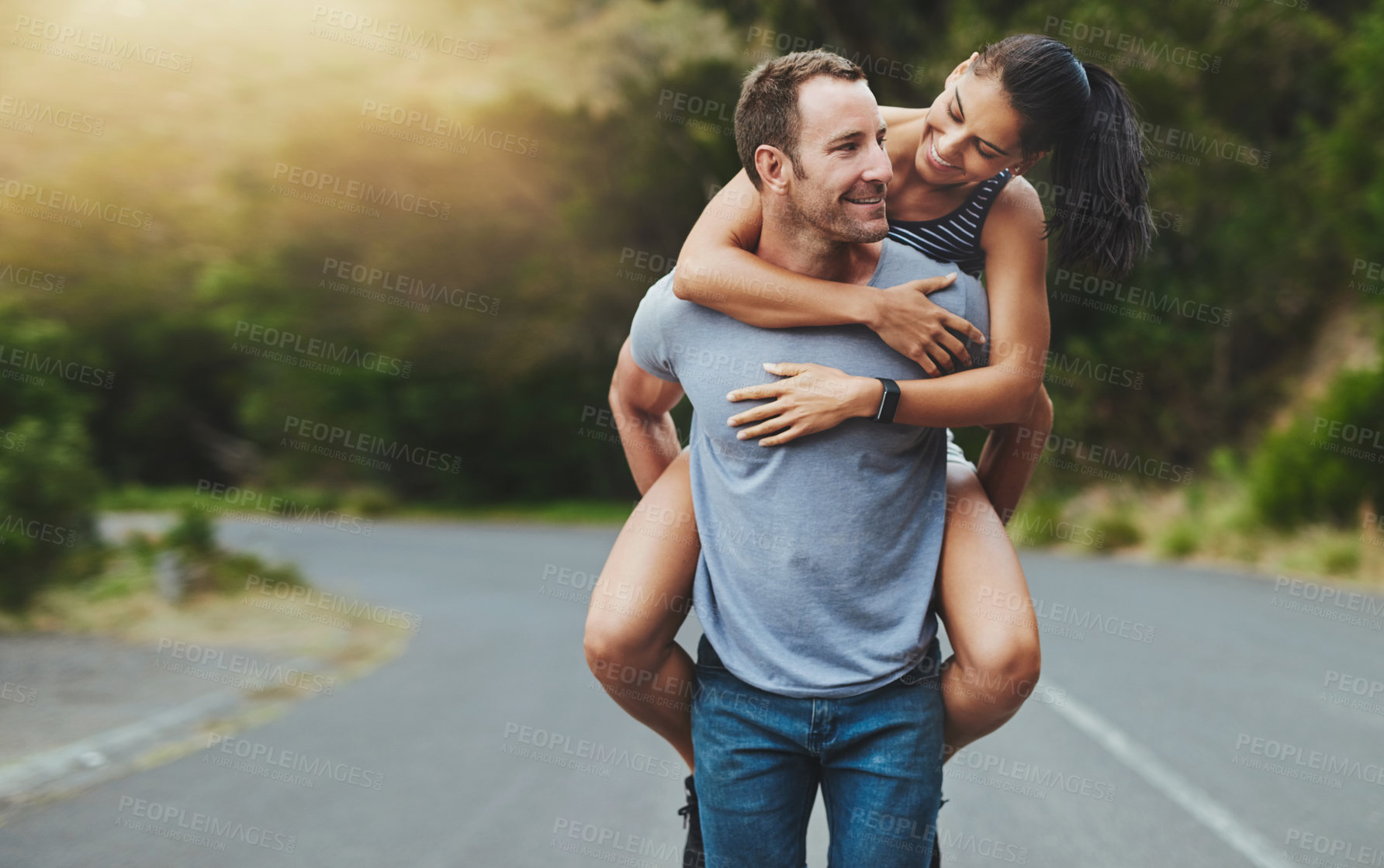 Buy stock photo Love, piggyback or happy couple walking on road or outdoor date for care, support or loyalty. Freedom, romantic man or woman on holiday vacation together to relax or smile on street for wellness