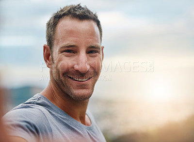 Buy stock photo Portrait, space or happy man in an outdoor selfie with confidence or freedom on holiday vacation. Face, sunrise blur or person hiking in summer to travel or taking photograph or picture for memory