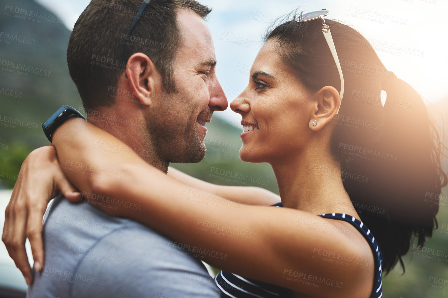 Buy stock photo Support, love or happy couple hug in park for date, trust or care in nature with peace, bond or freedom. Eye contact, romantic man or woman on outdoor holiday vacation together to relax or travel