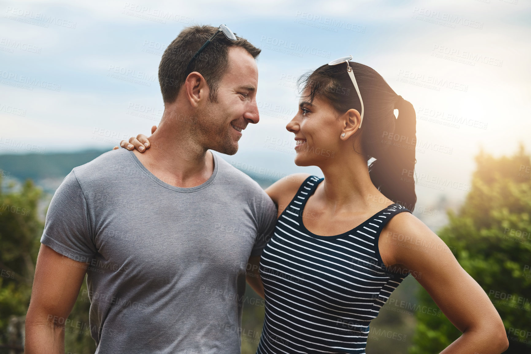 Buy stock photo Wellness, love or happy couple hug in park for date, support or care in nature with peace, bond or marriage. Eye contact, romantic man or woman on outdoor holiday vacation together to relax or travel