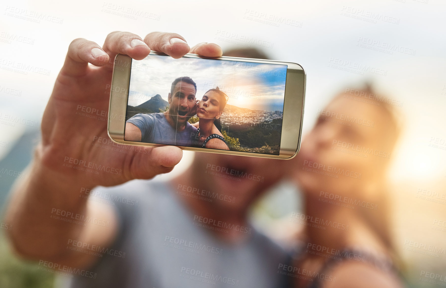 Buy stock photo Phone screen, selfie and portrait of couple in nature outdoor on summer vacation together. Mobile, face and picture of excited man and woman at park for connection, memory of love and relationship