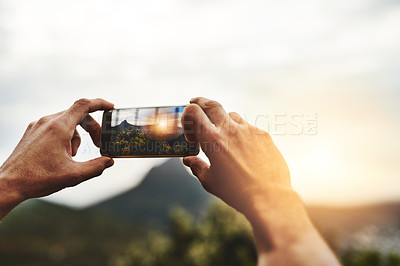 Buy stock photo Sunset, photography and hands of person with phone, screen and social media post of nature, landscape or sun. Cellphone, photo or man with tech for memory of vacation, holiday or outdoor view 