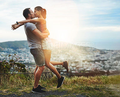 Buy stock photo Kiss, lift or happy couple hug in nature for outdoor date, love or trust with support, bond or freedom. Romantic man, care or woman excited by holiday vacation together to celebrate, relax or travel 