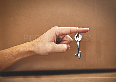 Buy stock photo Hand, keys and boxes with property in new house with opportunity, closeup and moving with real estate. Person, homeowner and package for investment, apartment and fresh start with mortgage for home