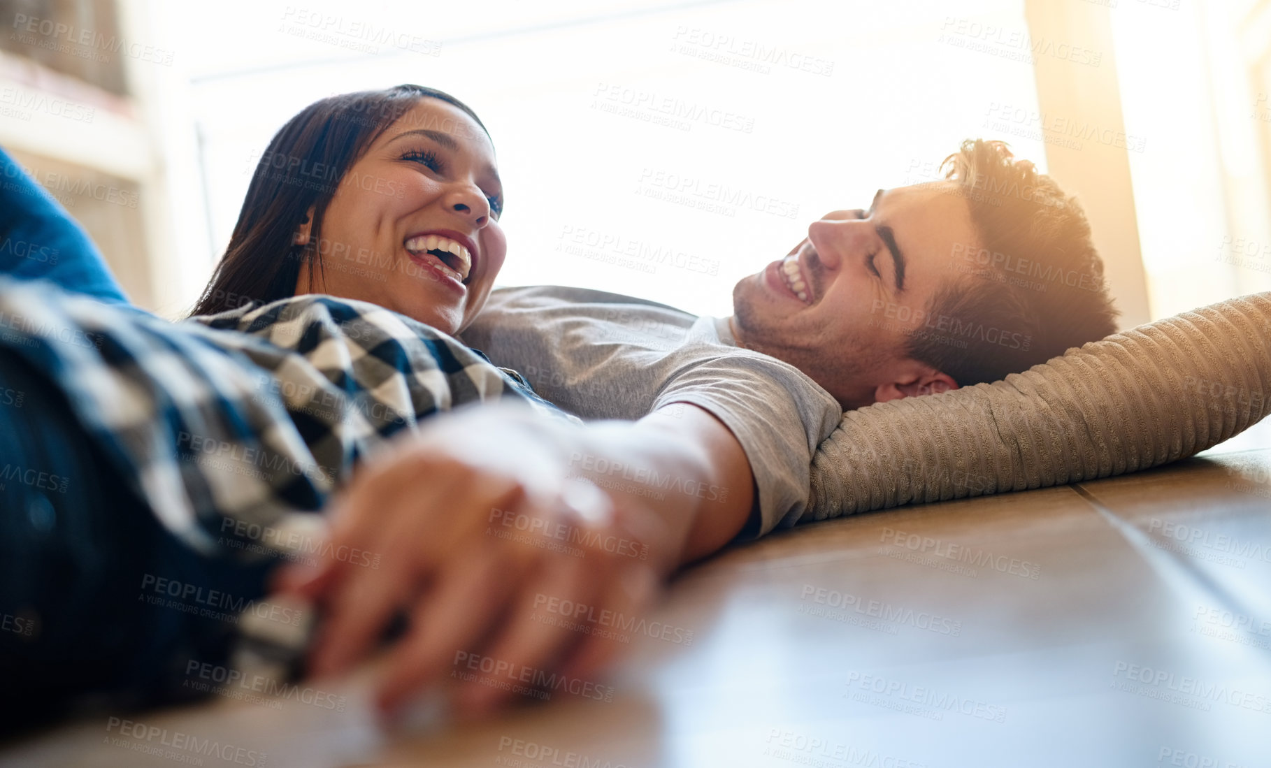 Buy stock photo Couple, talking and relax on floor of home, love and laughing for funny conversation in apartment. Happy people, speaking and laying on ground of living room, support and comedy in relationship