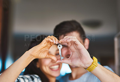 Buy stock photo Portrait of a happy young couple standing in the door of their new home