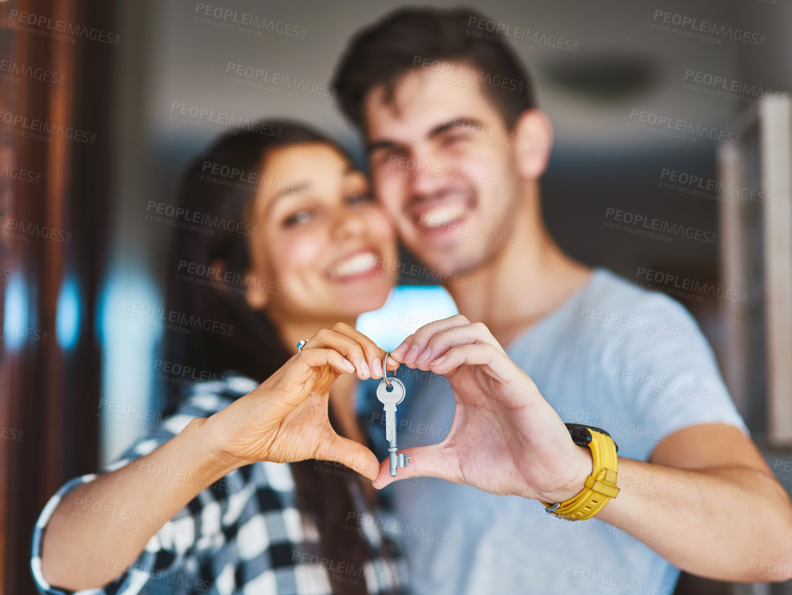 Buy stock photo New home, heart in hands and couple with keys for property, moving day and house investment. Homeowner, real estate and happy man and woman with keychain for mortgage, purchase and rental apartment