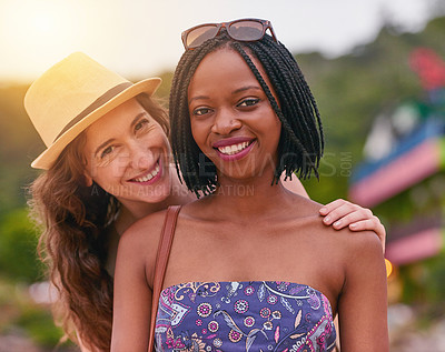 Buy stock photo Portrait of two young friends enjoying the day together outside