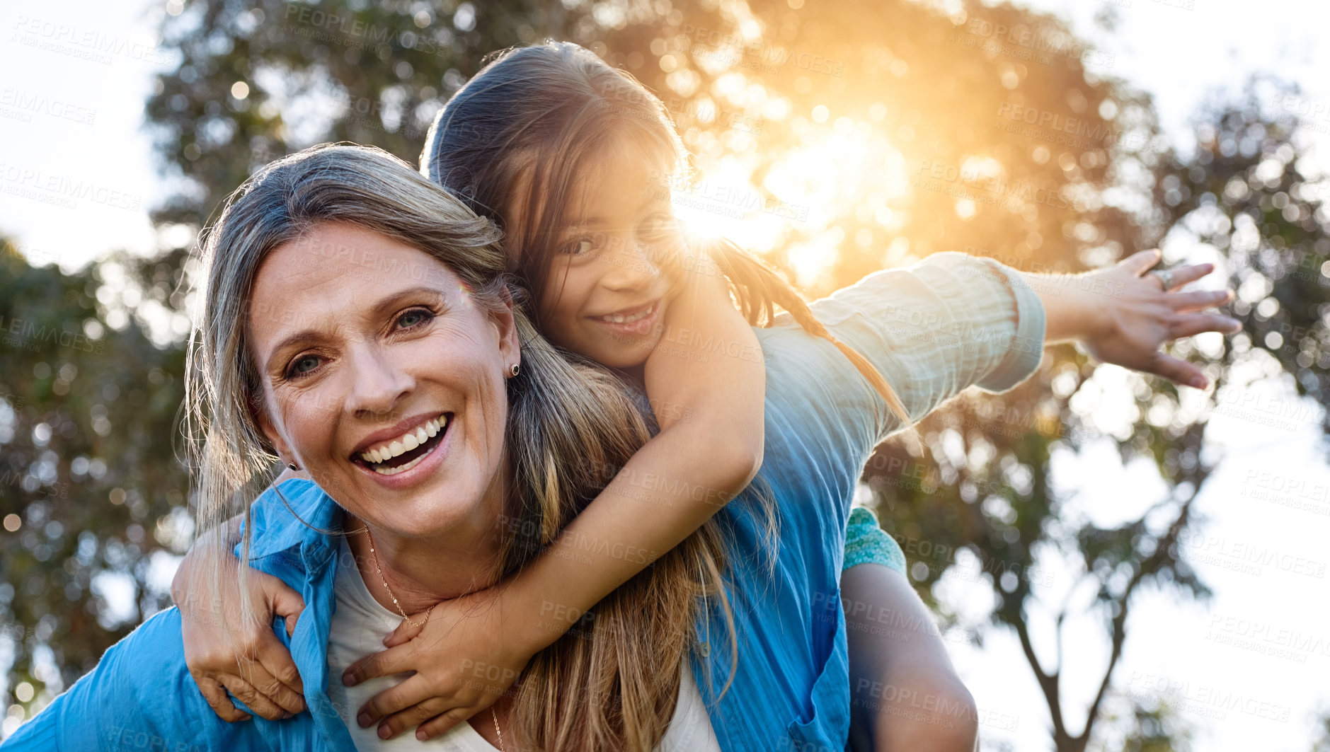 Buy stock photo Freedom, portrait or mother and daughter with piggyback, love or hug in park for fun, adventure or journey at sunset. Family, love or mom and girl in a forest with support, trust or back ride game