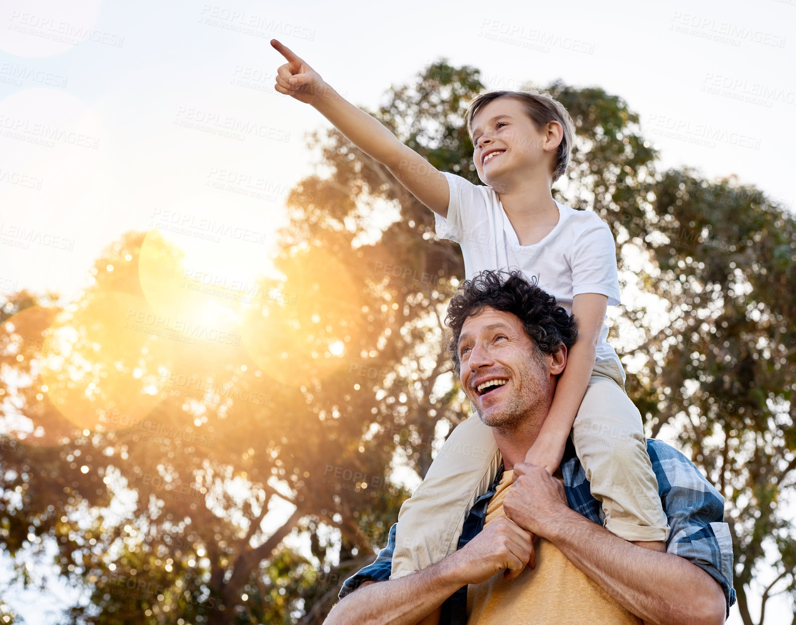 Buy stock photo Happy, father and boy on shoulder pointing outdoor together for future journey, development and love on weekend. Smiling, man and son outside playing in nature for adventure, courage and relationship