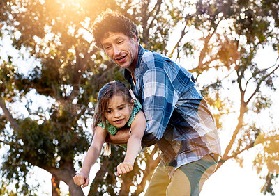 Buy stock photo Father, portrait and daughter playing plane outdoor with happiness for summer or holiday as family. Man, girl and smile by tree in nature with fun for freedom, love and fun together as superhero